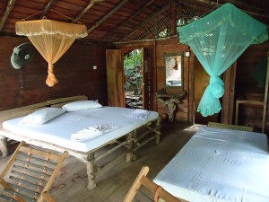 Our room at the ecolodge. For some reason they gave us three beds.