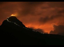 The sacred mountain of Adam’s Peak illuminated by light bulbs